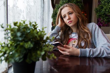 Girl Posing with Cell