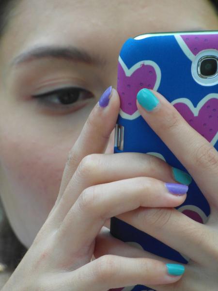 Girl Using Touch Screen Phone