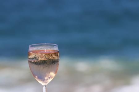 Glass of rose wine with ice