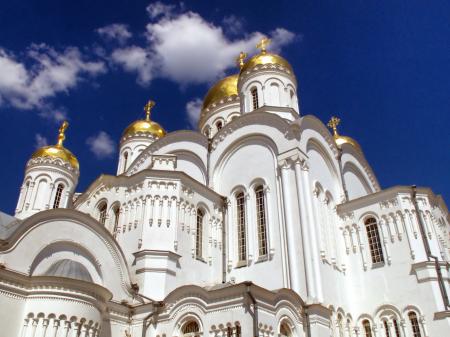 Gold and White Dome Building Under White Cumulus Clouds and Blue Sky