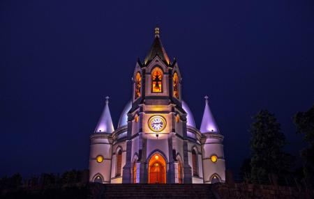 Gray and White Concrete Cathedral With Lights Photo