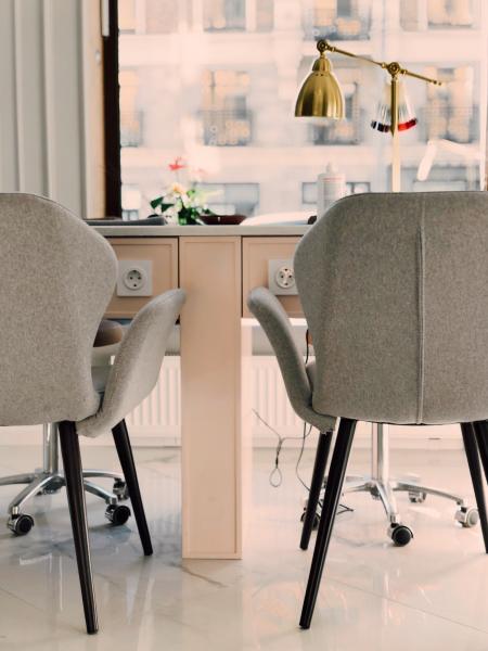 Gray Armchairs Beside White Wooden Desk