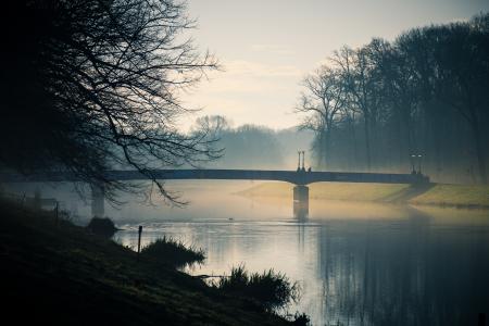 Gray Bridge Above River during Dusk