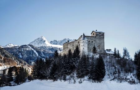 Gray Concrete Building on Snow Field