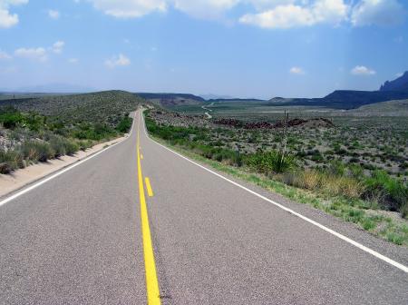 Gray Concrete Road With White Safety Line during Daytime