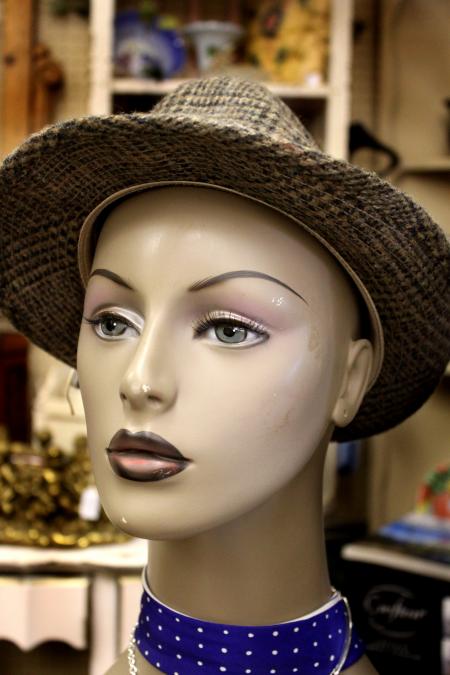 Gray hat on a mannequin