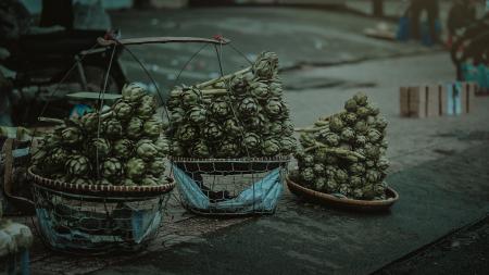 Gray Nuts With Three Baskets on Gray Table