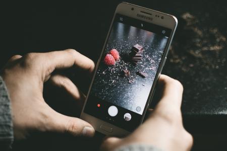 Gray Samsung Smartphone Showing Chocolates