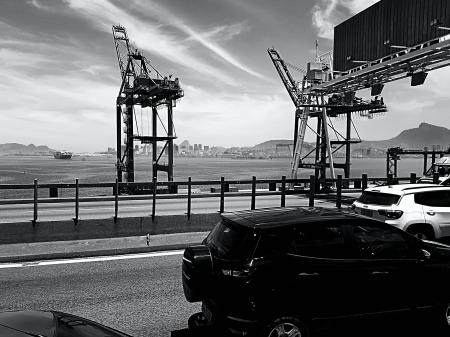 Gray Scale Photo of Black 5-door Hatchback Beside Black Sand Fields