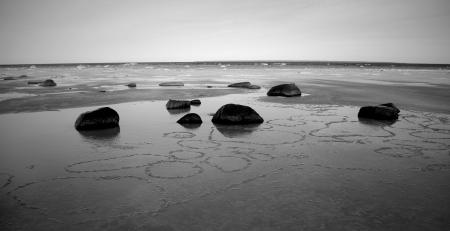 Grayscale Concrete Stones on Sand