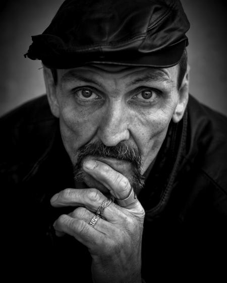 Grayscale of Photo of Men's Wearing Black Leather Hat