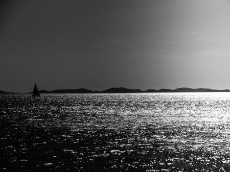 Grayscale Photo of a Body of Water