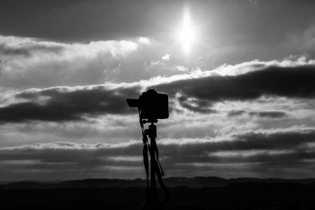 Grayscale Photo Of Camera Under The Sun