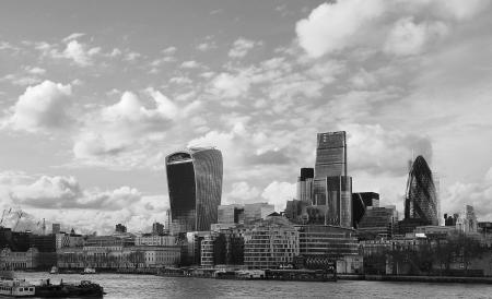 Grayscale Photo of City Near Body of Water