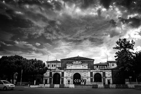 Grayscale Photo of Concrete Mansion