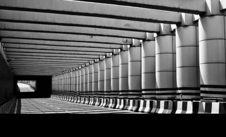 Grayscale Photo of Concrete Pathway