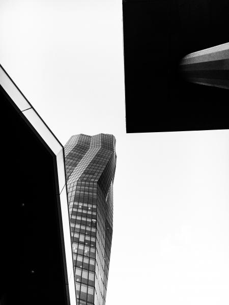 Grayscale Photo of Glass Curtain High Rise Building