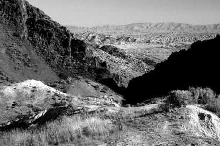 Grayscale Photo of Mountain Range