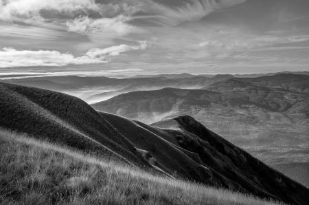 Grayscale Photo of Mountain Range