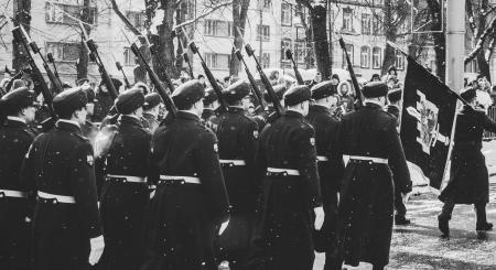 Grayscale Photo of Soldiers Matching