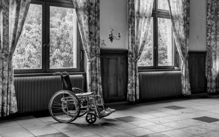 Grayscale Photo of Wheelchair