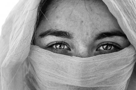 Grayscale Photography of a Person With Scarf