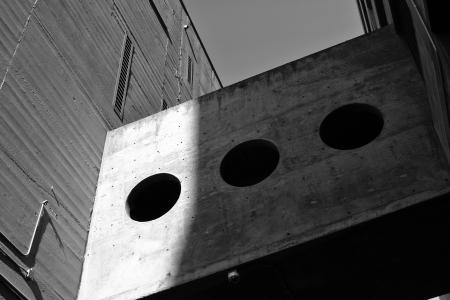 Grayscale Photography of Board With Three Round Holes