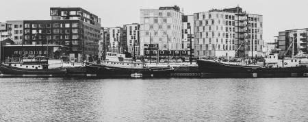 Grayscale Photography Of Buildings And River