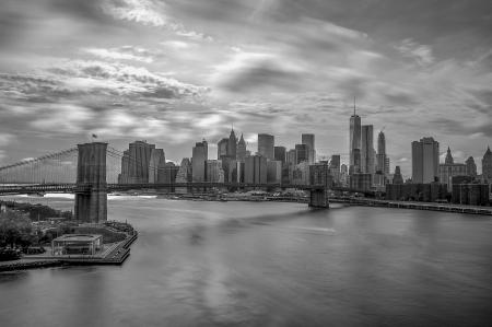 Grayscale Photography of City Buildings and Bridge