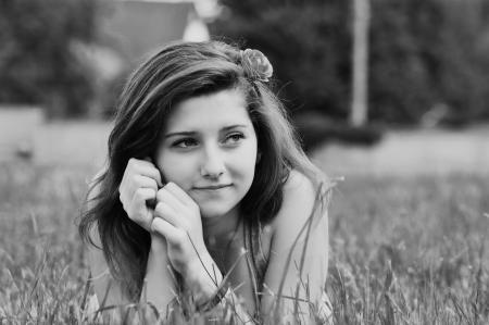 Grayscale Photography of Woman on Grass