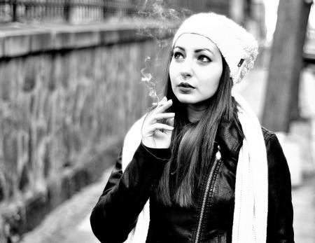 Grayscale Photography Of Woman Smoking