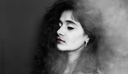 Grayscale Photography of Woman With Red Lipstick Wearing Hoop Earrings