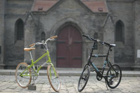 Green Bike Beside Black Bike