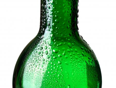 Green bottle with water drops