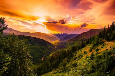 Green Mountain Near River Under Cloudy Sky during Daytime