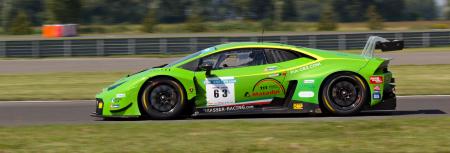 Green Sports Car on Gray Asphalt Road