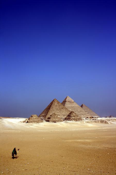 Grey Concrete Pyramids on the Middle of the Dessert during Daytime