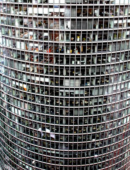 Grey Concrete Round High Rise Building