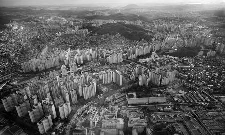 Grey High Rise Buildings Capture from High Angle in Greyscale Photo