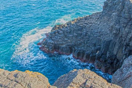 Grey Rock Formation Near Water