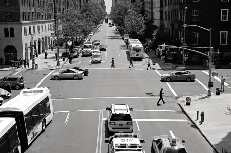 Greyscale Photo of Car and People on Streets