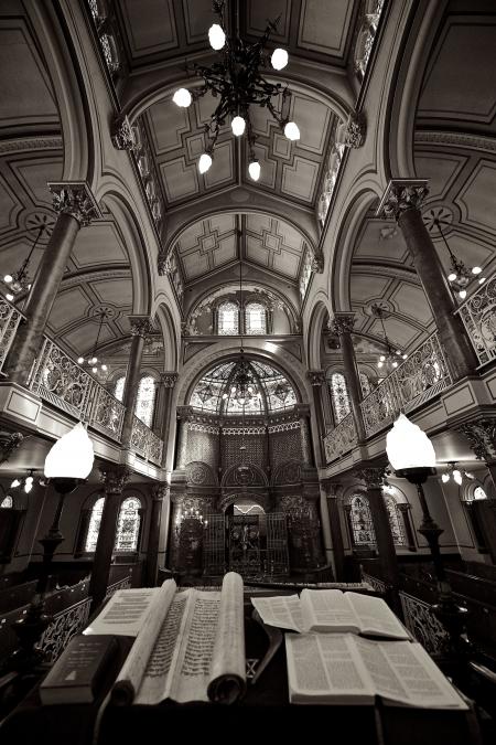 Greyscale Photography of Open Books on Table Inside Dome Building