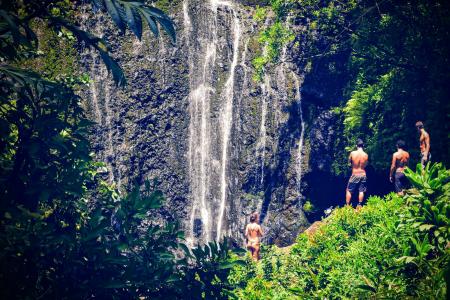 Group of People At A Waterfall