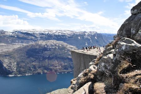 Group of People on Top of Mountain during Daytime