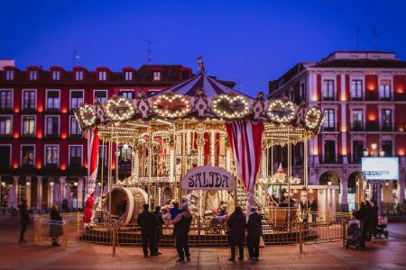 Group of People Standing at the Front of Carousel