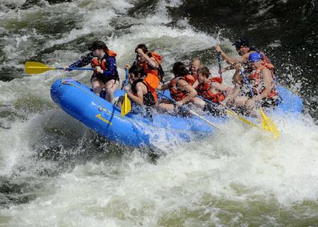 Group of Rafters in the River