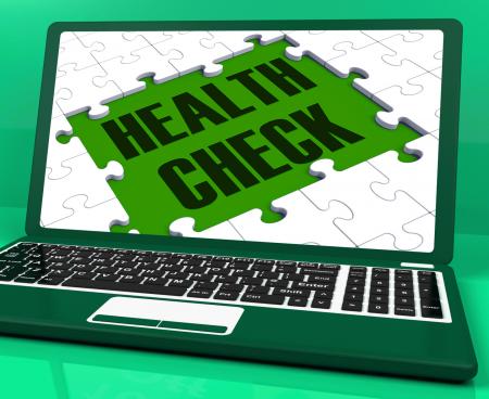 Health Check On Laptop Showing Medical Exams