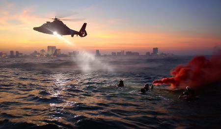 Helicopter flying over the Sea