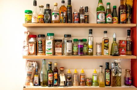 Herbs and oil bottles in kitchen