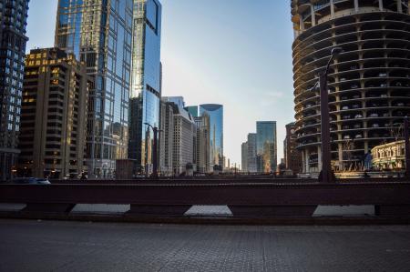 High Rise Buildings Under White Clouds and Blue Sky